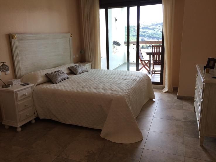 Main Bedroom with ensuite and doors to terrace